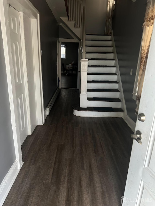 262 Hale St, New Brunswick, NJ 08901 - staircase with baseboards and wood finished floors