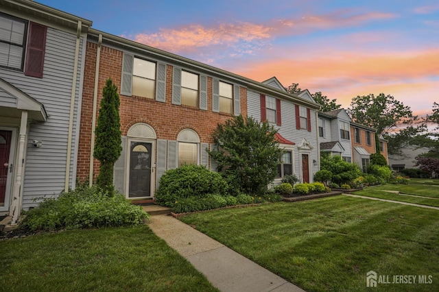 91 Pear Tree Ln, Franklin, NJ 08823 - multi unit property with a front lawn, brick siding, and a residential view
