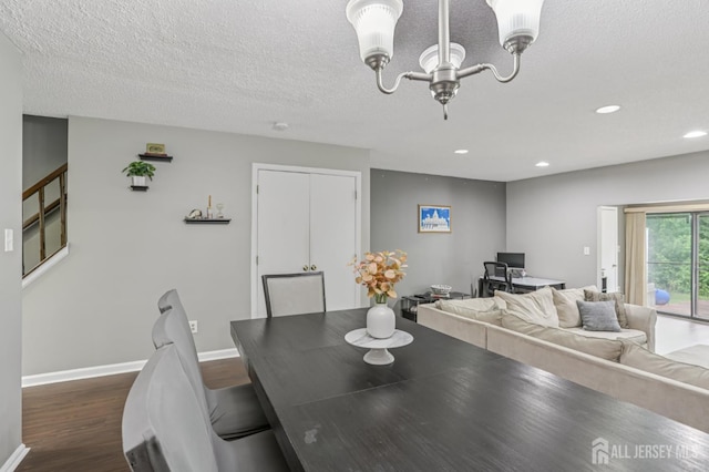 91 Pear Tree Ln, Franklin, NJ 08823 - dining space featuring dark wood-style flooring, a chandelier, recessed lighting, and a textured ceiling
