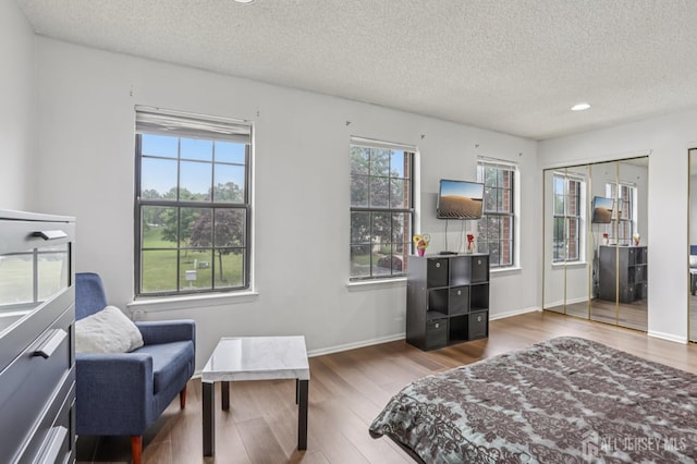 91 Pear Tree Ln, Franklin, NJ 08823 - bedroom featuring a textured ceiling, wood finished floors, and recessed lighting