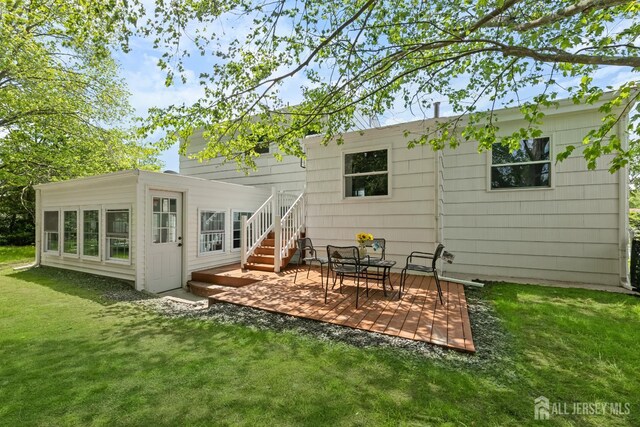 4 Arden Rd, Old Bridge, NJ 08857 - back of house with a deck and a lawn