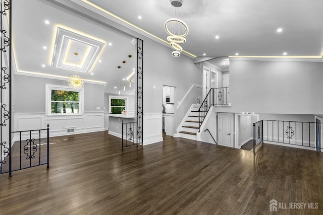 4 Arden Rd, Old Bridge, NJ 08857 - unfurnished living room with crown molding, a wainscoted wall, wood finished floors, a chandelier, and recessed lighting