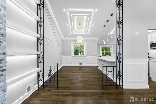 4 Arden Rd, Old Bridge, NJ 08857 - foyer featuring a decorative wall, dark wood-type flooring, wainscoting, and a high ceiling