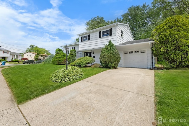 4 Arden Rd, Old Bridge, NJ 08857 - tri-level home featuring a front yard, concrete driveway, and an attached garage