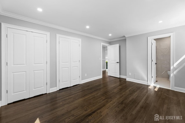 4 Arden Rd, Old Bridge, NJ 08857 - unfurnished bedroom featuring two closets, dark wood-style flooring, baseboards, recessed lighting, and crown molding
