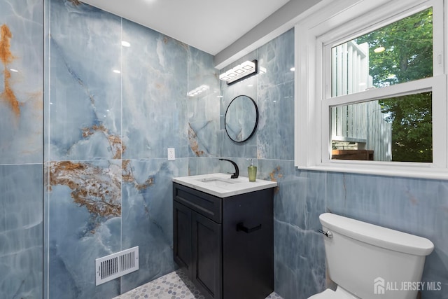 4 Arden Rd, Old Bridge, NJ 08857 - bathroom featuring tile walls, vanity, and toilet