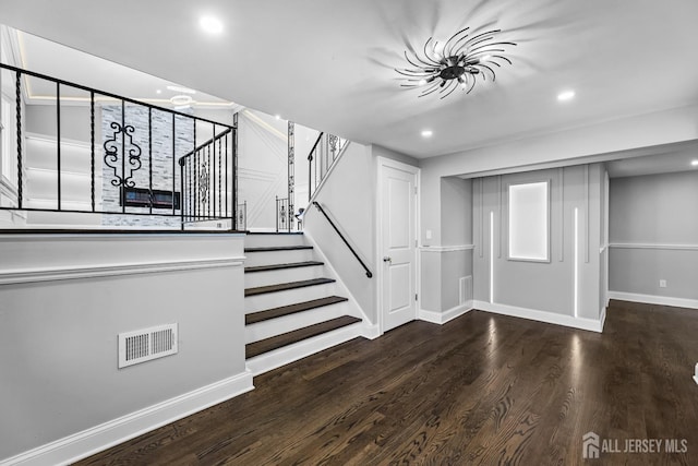 4 Arden Rd, Old Bridge, NJ 08857 - staircase featuring wood finished floors, recessed lighting, and baseboards