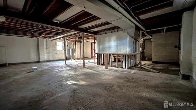 basement featuring gas water heater