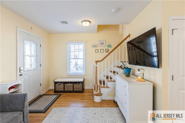 foyer entrance featuring light wood-type flooring