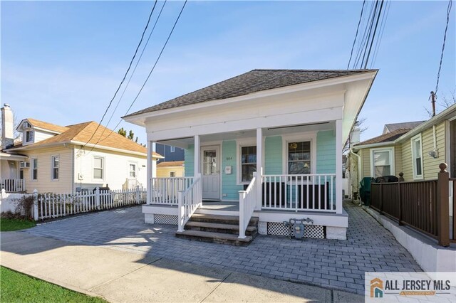 bungalow-style home with covered porch