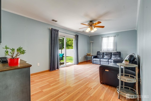 24 Christopher Ave, South Brunswick, NJ 08824 - living area featuring crown molding, a ceiling fan, light wood-style flooring, and baseboards
