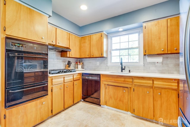 24 Christopher Ave, South Brunswick, NJ 08824 - kitchen with black appliances, a warming drawer, a sink, light countertops, and decorative backsplash