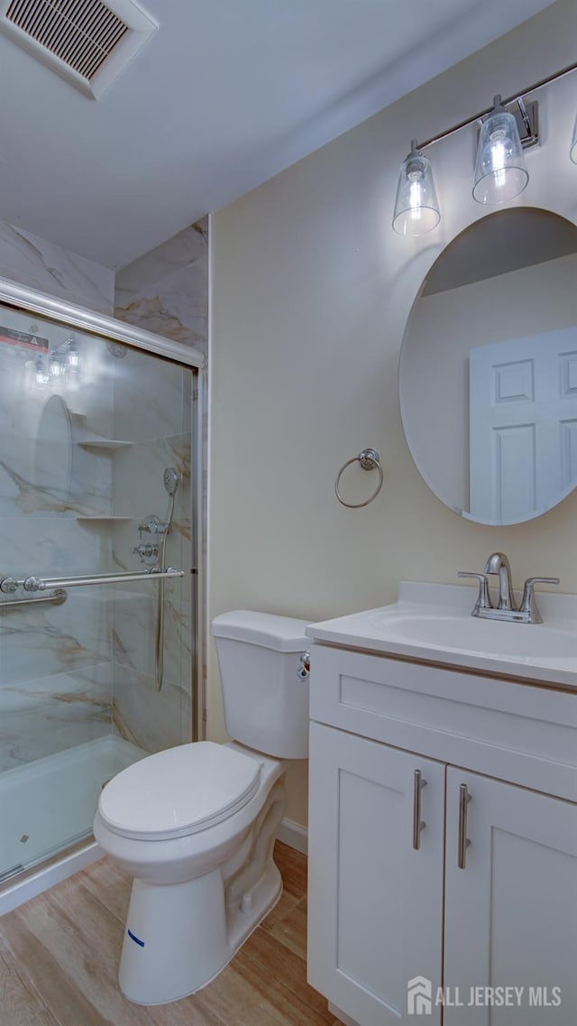 3 Cypress St Unit C, Toms River, NJ 08757 - full bath with vanity, a shower stall, and wood finished floors