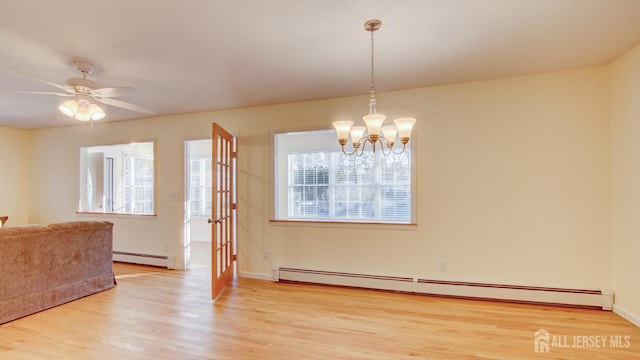 3 Cypress St Unit C, Toms River, NJ 08757 - empty room with a baseboard radiator, plenty of natural light, and light wood finished floors