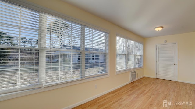 3 Cypress St Unit C, Toms River, NJ 08757 - unfurnished sunroom featuring plenty of natural light and an AC wall unit