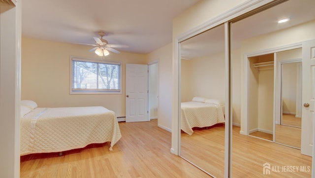 3 Cypress St Unit C, Toms River, NJ 08757 - bedroom with a baseboard radiator, light wood finished floors, and a ceiling fan