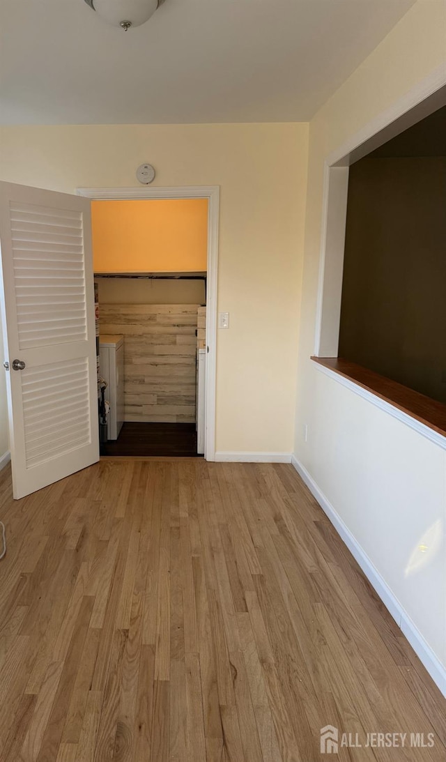 3 Cypress St Unit C, Toms River, NJ 08757 - unfurnished room with wood finished floors and a smoke detector