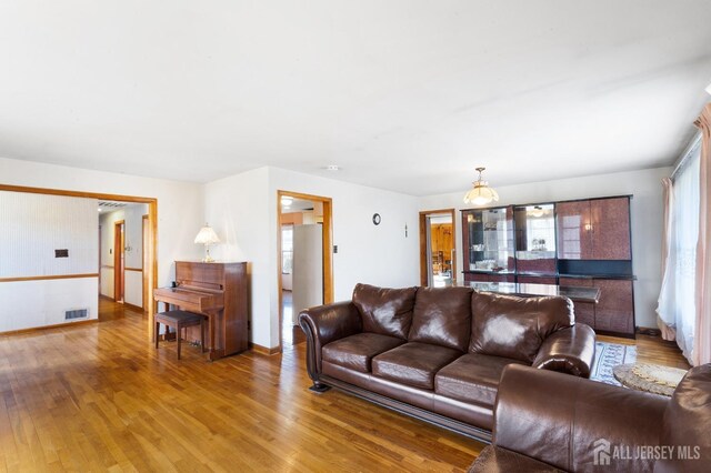 living room with hardwood / wood-style floors