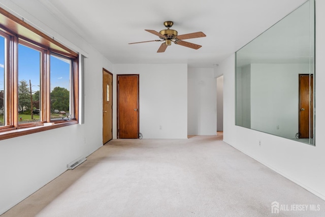 107 Athens Ave, Old Bridge, NJ 08879 - empty room with carpet floors and ceiling fan