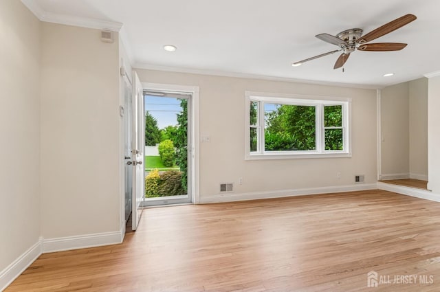 13 Spyros Dr, Old Bridge, NJ 08879 - spare room featuring healthy amount of natural light, ornamental molding, a ceiling fan, light wood-type flooring, and recessed lighting