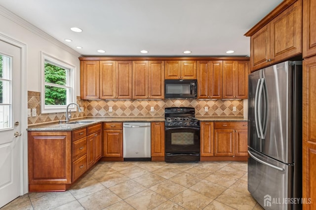 13 Spyros Dr, Old Bridge, NJ 08879 - kitchen featuring black appliances, brown cabinetry, ornamental molding, backsplash, and stone countertops