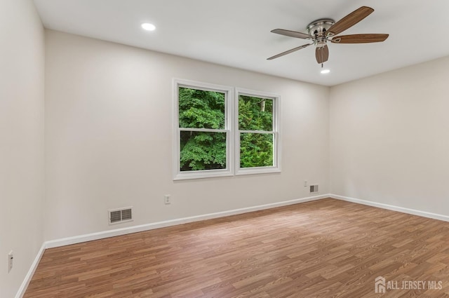 13 Spyros Dr, Old Bridge, NJ 08879 - empty room with a ceiling fan, wood finished floors, and recessed lighting