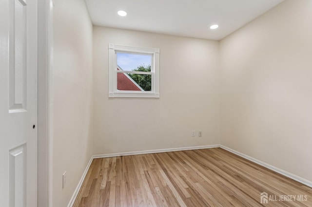 13 Spyros Dr, Old Bridge, NJ 08879 - empty room with light wood-type flooring and recessed lighting