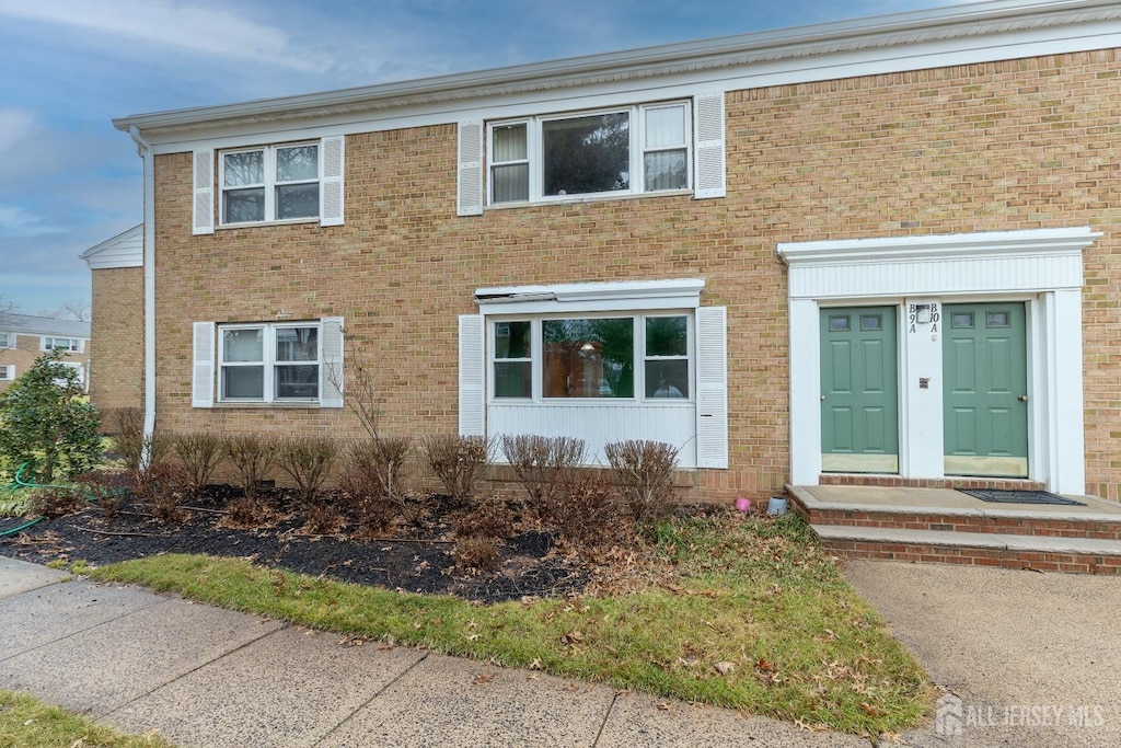 multi unit property with brick siding