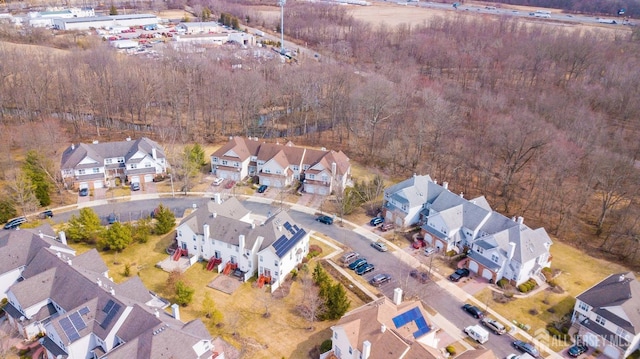 birds eye view of property with a residential view