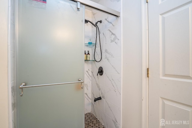 bathroom with a stall shower