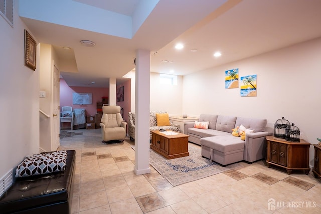 living room with recessed lighting, visible vents, and light tile patterned floors