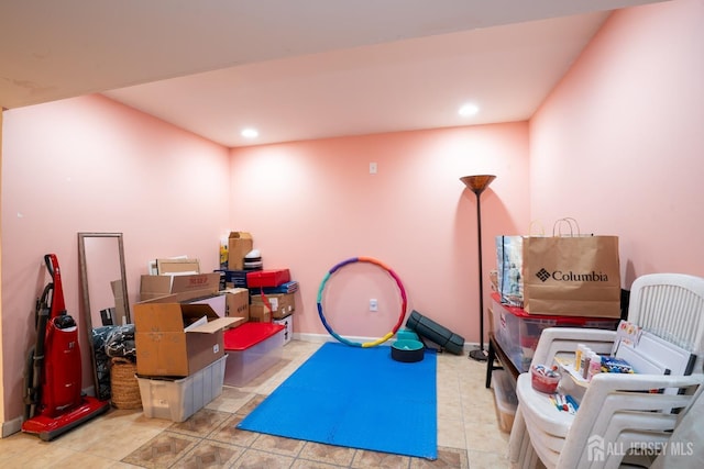 rec room with recessed lighting and baseboards