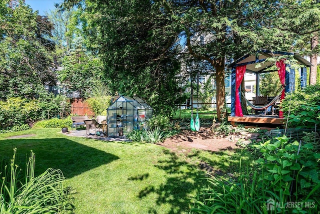 227 Lawrence Ave, Highland Park, NJ 08904 - view of yard featuring an exterior structure, an outbuilding, and a gazebo
