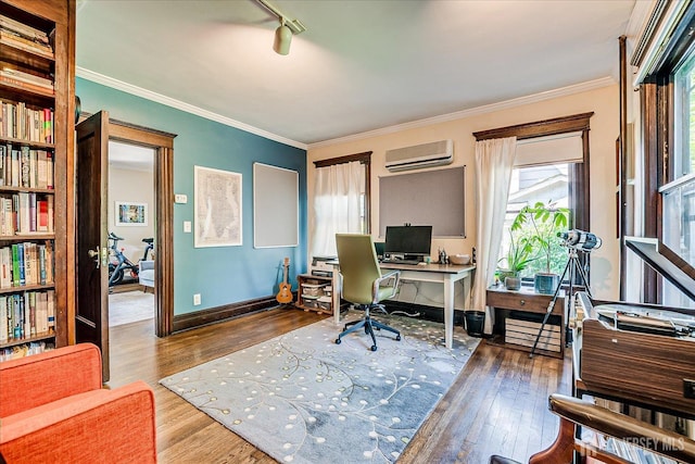 227 Lawrence Ave, Highland Park, NJ 08904 - home office featuring a wall mounted AC, wood finished floors, plenty of natural light, and ornamental molding