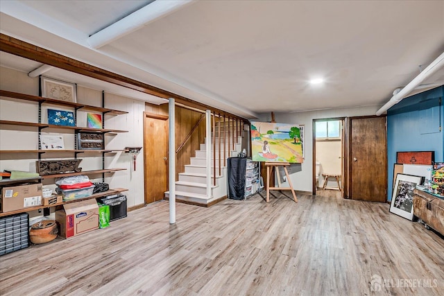 227 Lawrence Ave, Highland Park, NJ 08904 - basement with wood finished floors and stairway