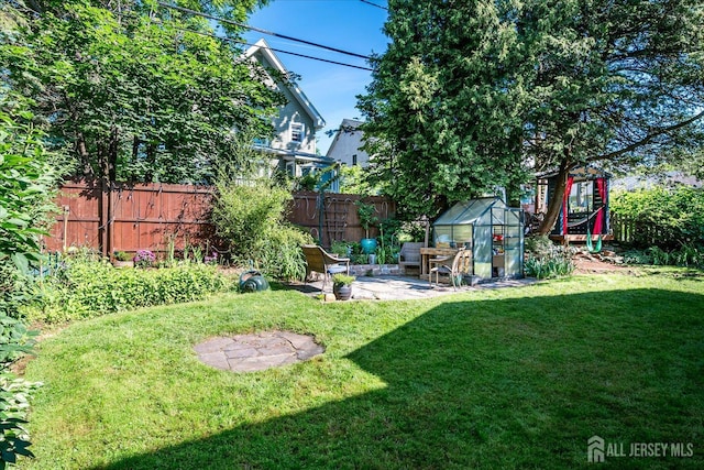 227 Lawrence Ave, Highland Park, NJ 08904 - view of yard with a greenhouse and an outbuilding