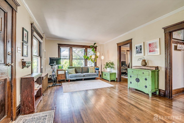 227 Lawrence Ave, Highland Park, NJ 08904 - living area featuring hardwood / wood-style flooring and crown molding