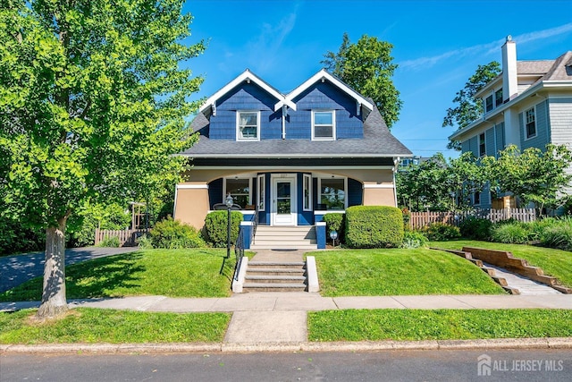 227 Lawrence Ave, Highland Park, NJ 08904 - view of front of property with a porch and a shingled roof