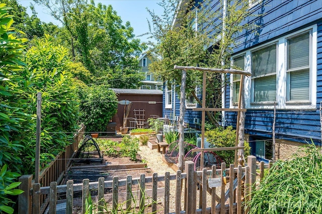 227 Lawrence Ave, Highland Park, NJ 08904 - view of yard with a storage unit and a garden