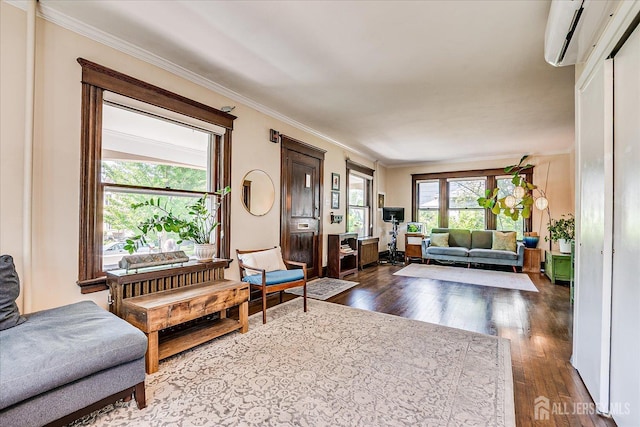 227 Lawrence Ave, Highland Park, NJ 08904 - living area with dark wood-type flooring, an AC wall unit, and crown molding