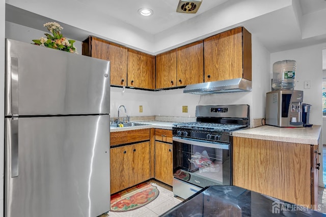 199 Evergreen Rd Unit 6A, Edison, NJ 08837 - kitchen with appliances with stainless steel finishes, ventilation hood, a sink, light countertops, and brown cabinetry
