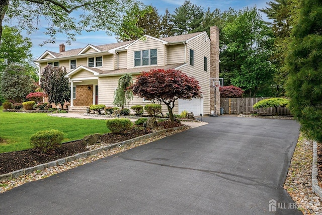 8 Renee Ct, Edison, NJ 08820 - view of front of property with a chimney, driveway, an attached garage, and a shingled roof
