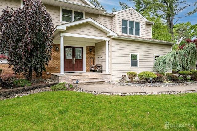 8 Renee Ct, Edison, NJ 08820 - view of front of home featuring a front lawn and brick siding