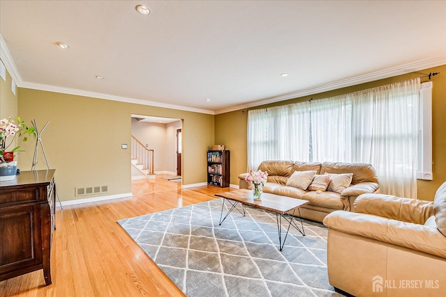 8 Renee Ct, Edison, NJ 08820 - living room featuring stairs, light wood-style flooring, baseboards, crown molding, and recessed lighting