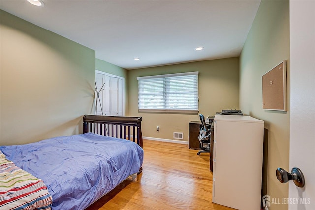 8 Renee Ct, Edison, NJ 08820 - bedroom with light wood finished floors, baseboards, recessed lighting, and a desk