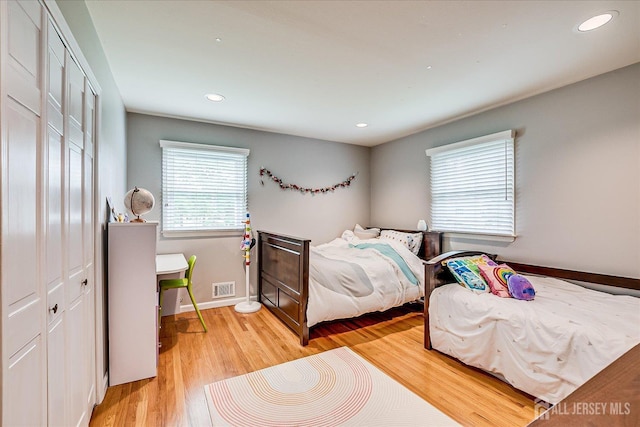 8 Renee Ct, Edison, NJ 08820 - bedroom with a closet, light wood finished floors, baseboards, and recessed lighting