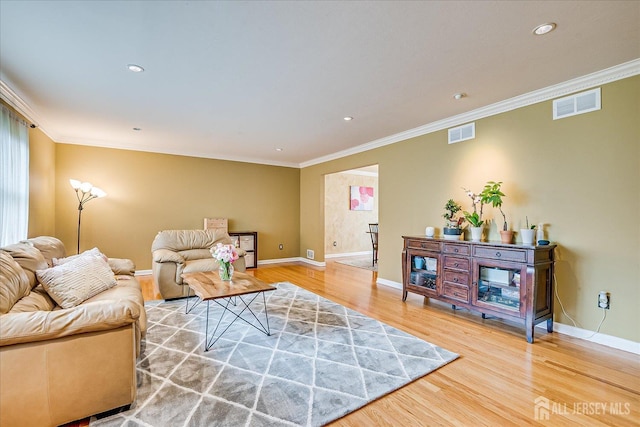 8 Renee Ct, Edison, NJ 08820 - living area featuring wood finished floors, ornamental molding, baseboards, and recessed lighting