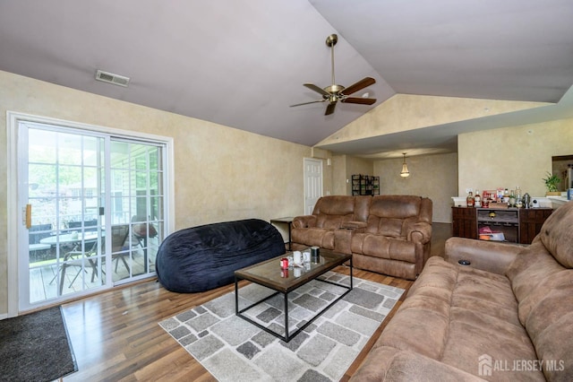 219 Vasser Dr, Piscataway, NJ 08854 - living room with wood finished floors, ceiling fan, and vaulted ceiling