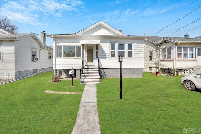 view of front of property with a front lawn