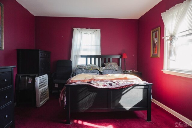 bedroom featuring carpet flooring